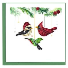 christmas card with two birds hanging from the tree branch and one bird is wearing a santa hat