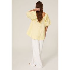 Yellow cotton (77% Cotton, 23% Nylon). Top. Short sleeves. V-neckline. 25.5" from shoulder to hemline. Imported. Neon Yellow Tops, Rent The Runway, Yellow Top, Closet Designs, Puff Sleeve Top, Neon Yellow, Puff Sleeve, Sleeve Top, Short Sleeves