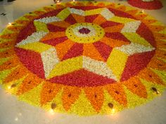 a large flower arrangement with lights on the floor