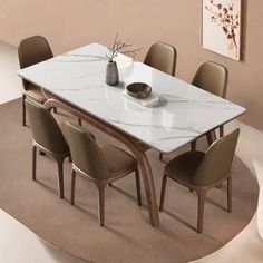 a dining room table with chairs and a vase on the top, in front of a beige wall