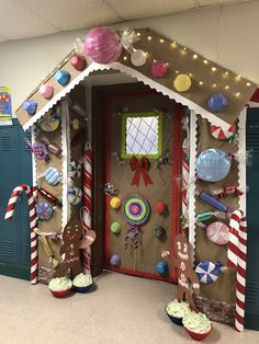 a gingerbread house decorated with candy and candies