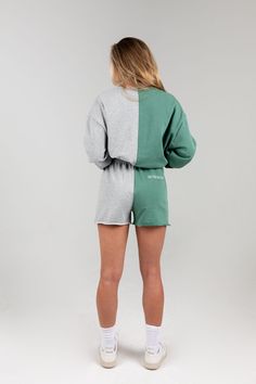 Say Less, Mean More embroidered on top left back leg. Two tone colored legs are a heather grey and winter green NOTE: Model is 5'9 and wearing S/M FABRIC DETAILS: 100% Cotton Grey Sweatshorts, The Mayfair Group, Mayfair Group, Lounge Outfits, Say Less, Outfit Inso, Winter Green, Black Biker Shorts, Crop Sweatshirt