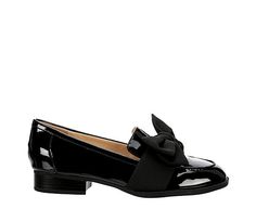 Bandolino Lindio Women&apos;s Loafer Tailor your look to fit in the Lindio women&apos;s Loafer from Bandolino. Featuring a patent leather upper with an oversized bow accent for extra style, this cutaway Slip-On adds to your outfit&apos;s charm. The insole cushions your foot, while the low heel offers subtle lift. Synthetic upper Slip-On Bow detail Padded footbed1 block heel Spring Formal Flats With Bow, Spring Bow Loafers For Work, Spring Patent Leather Flats For Office, Low Heel Flats With Bow For Work, Formal Chic Patent Leather Flats, Spring Formal Loafers With Bow, Flat Heel Loafers With Bow For Workwear, Patent Leather Flats For Formal Spring Occasions, Spring Formal Loafers With Bow Detail