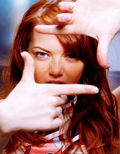 a woman making the v sign with her fingers