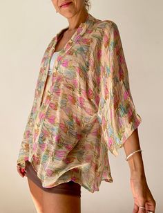 Summer over top with floral prints Lightweight sheer silk material, feels like mist, comfy loose and wide fit with Perfect daily cover up for all year round  MEASURE Size M/L Shoulder 16" Bust 44" Length 26" MATERIAL * crepe silk  * no lining  For more boho style ideas please visit also  https://www.etsy.com/uk/shop/Gyaki Thank you for looking Over Coat, Boho Tunic Tops, Maternity Blouse, Boho Tunics, Top Summer, Silk Material, Oversized Shirt, Summer Tops, Cotton Silk