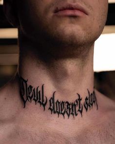 a man with a tattoo on his neck saying, they all forgot us to die