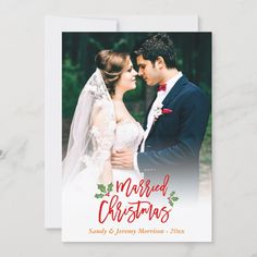 a christmas card with a photo of a bride and groom kissing in front of the words married christmas