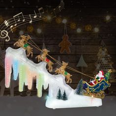 an illuminated christmas sleigh with reindeers and musical notes