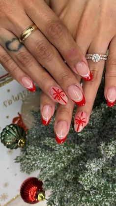 Simple French Christmas Nails, Long Almond Acrylic Nails Christmas, Christmas Nail Inspo Red And Green, Xmas Nails Red And Green, Christmas Red French Tip Nails, Festive French Tip Nails, Christmas Nails Red Almond, Christmas Red Tip Nails, Christmas French Tip Nails Round