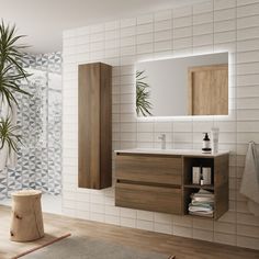 a bathroom with a sink, mirror and plant in the corner on the wall next to it