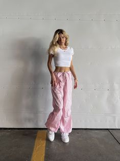 Shop our Influencers' top picks on Amazon Pink And White Streetwear Outfit, Outfits With Pink Cargo Pants, Pink Streetwear Outfit, Light Pink Cargo Pants, Pink Sweatpants Outfit, Pink Parachute Pants