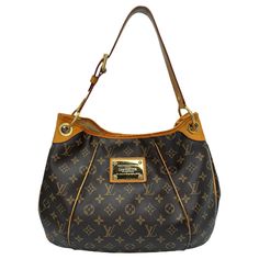 This stylish shoulder bag is finely crafted of classic Louis Vuitton monogram on toile canvas. It features an adjustable vachetta leather shoulder strap, vachetta leather piping and trim complete with polished brass hardware including a large engraved front plate. The top opens to a light beige microfiber interior with pockets. Brand: Louis Vuitton Material: Monogram coated canvas; Cowhide trim Date/Authenticity Code: SD3131 Production Year: 33th week of 2011 in the U.S.A. Measurements: 14" x 11