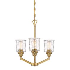 an antique brass chandelier with clear glass shades