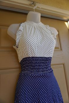 "Vintage 1970s blue and white polkadot maxi dress by JC Penney. Fits sizes 3-7. In very good vintage condition! Measurements taken across front laid flat 17\" across front armpit to armpit waist up to 30\" 19\" across hips length 55\"" Fitted Polka Dot Maxi Dress With Ruffles, Fitted Polka Dot Ruffled Maxi Dress, Football Sweatshirt, Signature Print, Hip Length, Hooded Jacket, 1970s, Pullover Hoodie, Navy Blue