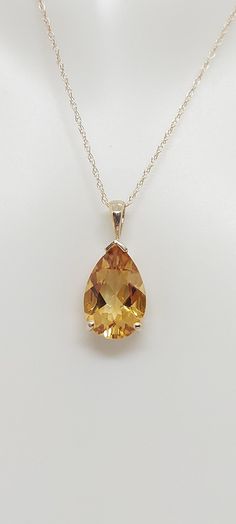 "CITRINE Drop 14k Yellow Gold Pendant / Necklace. Natural stone. 18\" gold Rope Chain necklace. Tear Drop Gemstone Jewelry. Yellow Citrine. November Birthday Stone. Product Info: - Stone: Tear Drop Yellow Citrine. - Color: Yellow. - Pendant Measures: 20mm x 8mm. - Stone Measures: 14x8mm - Stone Carat: 3.50 Ct - Metal: 14k Yellow Gold. - Chain Length: 18 inches Rope Chain. - Made in USA. - Nice Gift Box Included." Yellow Gem Necklace, Citrine Jewelry Necklace, Citrine Pendant Necklace, Yellow Stone Necklace, Yellow Topaz Necklace, Yellow Jewelry Necklace, Yellow Topaz Jewelry, Yellow Gemstone Necklace, Ethereal Jewelry