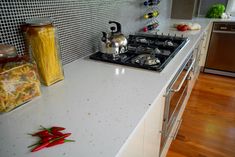 the kitchen counter is clean and ready for us to use in its cooking seasoning