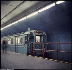 the train is stopped at the station waiting for passengers to get on or off it