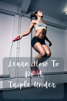 a woman jumping with a jump rope in her hand and the words learn how to do a triple under