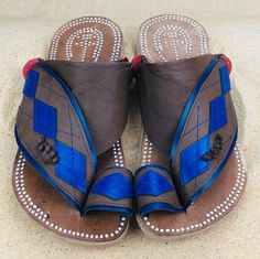 Use code COMBINEDSHIPPING and get $50 off your second pair. Check out all men's leather sandals: https://www.etsy.com/shop/sandcruisers/?section_id=25459641 Traditionally Arabian soles have a red ring on the side. You will love these traditional Arabian sandals. The straps and soles are made of leather. The leather lining will feel so soft and comfortable against your foot. They are designed to fit your foot loosely with lots of room in the toe-ring and straps. The leather sole will mold and sha Blue Leather Sandals, Summer Leather Sandals, Mens Slide Sandals, Argyle Diamonds, Red Ring, Mens Shoes Sandals, Leather Sandals Handmade, Mens Leather Sandals, Brown Leather Sandals