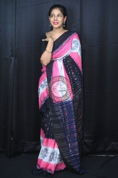 Weaver communities of Maniabandha and Nuapatana of Odisha traditionally weave this kind of saree. Common motifs are star, temple, conch, rudraksh, fish, chakra, lotus etc. The inspiration of all its designs comes from nature. It is the best of single ikat; one of warp and weft is tied and dyed prior to weaving. The borders and the pallas have tremendous variety and each one of them is attractive and praiseworthy. Specification:  Occasion: Festive Wear Fabric: Khandua Cotton Primary Color: Pink S Multicolor Ikat Print Pre-draped Saree For Navratri, Navratri Ikat Print Pre-draped Saree, Traditional Ikat Print Pre-draped Saree For Festivals, Traditional Multicolor Pre-draped Saree For Navratri, Traditional Drape Blouse Piece With Ikat Print For Festivals, Traditional Ikat Print Blouse For Festivals, Festive Ikat Print Saree For Traditional Ceremonies, Traditional Multicolor Handloom Pre-draped Saree, Traditional Ikat Blouse Piece For Diwali