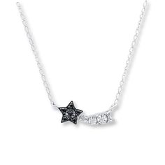 A shooting star that twinkles with accents of black and white diamonds spans this stellar necklace, perfect for young teens. Fashioned from heavenly sterling silver, the pendant is suspended from a 17-inch curb link chain that secures with a spring ring clasp. Black diamonds are treated to permanently create the intense black color. Blavk Star Daphire Necklaces, Star Diamond Necklace, Jewellery Fashion Shoot, Shooting Star Necklace, Silver Engraved Bracelet, Diamond Star Necklace, Mens Silver Necklace, Silver Jewelry Fashion, Fancy Diamonds