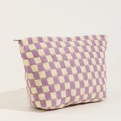 This checker makeup bag is a must-have for any fashion-forward individual. With its streamlined design and spacious interior, this bag is perfect for organizing your makeup and toiletries while on the go. The zip closure ensures your items stay secure, while the custom patch adds a unique touch. Stay on trend and organized with this preppy and trendy bag. Small Travel Bag, Checker Design, Checkered Design, Toiletries Organization, Custom Patches, Yellow Plaid, Purple Bags, Plaid Fashion, Makeup Pouch