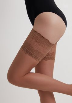 20 denier Flame fashion stockings by Conte Elegant is outstanding stockings with the most beautiful lace top, which, like a border, separates elastic yarn and delicate skin. They call more to the open part of the thigh than simply hide the body. They create a contrast of fabric and skin in appearance and feeling.Flame stockings by Conte Elegant are made of multi-filament Lycra yarn, which provides high elasticity, durability and softness. These stockings are well kept on the legs due to the wide Warm Socks, High Knees, Womens Tights, Sock Gifts, Ankle Socks, Bra Lingerie, Socks For Sale, Mens Socks, Knee High Sock