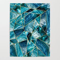 an abstract blue and green marble pattern mousepad with gold trimmings on it