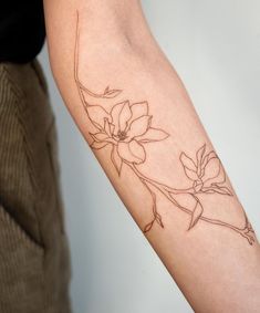 a person with a tattoo on their arm