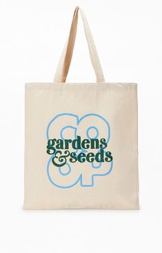 GARDENS & SEEDS Co-Op Tote Bag | PacSun Casual Travel Shoulder Bag With Logo Print, Casual Logo Print Shoulder Bag For Travel, Casual Shoulder Bag With Logo Print For Travel, Travel Cotton Shoulder Bag With Logo Print, Travel Shoulder Bag With Logo Print In Cotton, Casual Shoulder Bag With Logo For Daily Use, Canvas Bags With Logo Print For Shopping, Rectangular Travel Bags With Logo Print, Rectangular Travel Bag With Logo Print