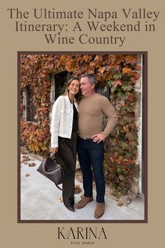 a man and woman standing next to each other in front of a building with vines on it