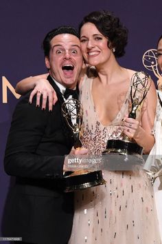 two people hugging each other while holding their awards at the 69th annual daytime show