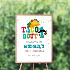 a sign that says taco bout welcomes to michael's first birthday on it