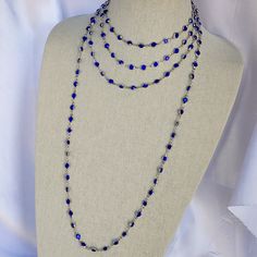 This gorgeous rhodium 72-inch sapphire crystal necklace fits right over your head! No clasps. Wear it as a dynamic single strand, double or triple it! Best for that long shirt look or give a simple outfit a beautiful pop! Makes a stunning wrap-around bracelet https://www.etsy.com/shop/AmysFinery Blue Lariat Jewelry For Party, Blue Lariat Necklace For Party, Pink Crystal Necklace, Blue Crystal Necklace, Simple Outfit, Pink Crystal, Long Shirt, The Head, Blue Crystals