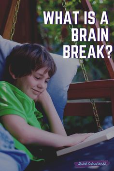 a young boy sitting in a swing reading a book with the caption what is a brain break?