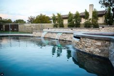 a large pool with water running from it