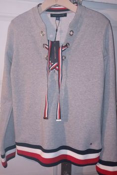 Tommy Hilfiger Women's Lace Up Top with Global Hem NWT size small Heather Grey Please look at all pictures and ask any questions before buying as I don't accept returns. Thank you (NBT) Lace Up Top, Tommy Hilfiger Outfit, Tommy Hilfiger Women, Women Lace, All Pictures, Quarter Zip, Heather Grey, Tommy Hilfiger, Look At