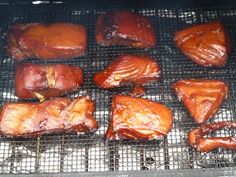 the meat is cooking on the grill and ready to be cooked in the oven for consumption