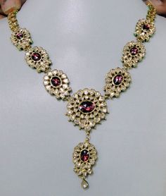 "Vintage 22K solid gold, Old cut Diamonds set with multicolor Enamel work necklace (Kundan Meena choker)with Matching Earrings. A nice old design from the 60s with old cut diamonds. A solid piece of jewelry set with color stones great workmanship. Length of necklace -28 cm (11.02\") Size could be adjusted according to your requirement by adding an adjustable cord. The width of Centerpiece-7 cm (2.75\"), the total weight of set -100.860 Grams (3.55 ounce). Length of earrings-6.5 cm,width of earri 22k Gold Kundan Necklace For Diwali, 22k Gold Kundan Necklace With Meenakari, Ceremonial Yellow Gold Kundan Necklace With Meenakari, Ceremonial Kundan Meenakari Necklace In Yellow Gold, Traditional Yellow Gold Kundan Necklace For Diwali, Round Kundan Temple Necklace With 17 Jewels, Kundan Necklace With 17 Jewels, Yellow Gold Kundan Temple Necklace With Meenakari, Festive 22k Gold Kundan Necklace With Stone Work