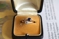 Crafted in 18-carat yellow gold, this exquisite ring features a natural round sapphire of approximately 0.3 carats and an old-cut diamond of around 0.3 carats. 1900 Antique Ring toi et moi Diamond and Sapphire  -Free shipping and Resizing offered- Weight: 2.5 g Size: 50.5 FR (5.5 US - K 1/2 UK) - Resizing offered Metal: 18-carat gold Stones: Sapphire: Approximately 0.3 carats Diamond: Approximately 0.3 carats Diamond Quality: Estimated SI Diamond Color: Estimated I/J Hallmark: Eagle's head (18-c Antique Brilliant Cut Sapphire Ring As Gift, Antique Sapphire Ring With Brilliant Cut, Yellow Gold Sapphire Ring With Brilliant Cut For Proposal, Vintage Brilliant Cut Sapphire Ring Gift, Antique Sapphire Diamond Ring Gift, Vintage Sapphire Ring With Brilliant Cut For Gift, Vintage Solitaire Sapphire Ring As Gift, Classic Sapphire Birthstone Ring For Proposal, Vintage Sapphire Ring As A Gift