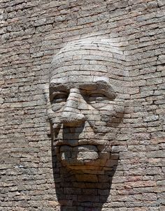 a brick face on the side of a building