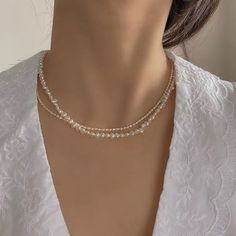 👌 M A T E R I A L * Genuine Natural Freshwater Pearl * This product is hypoallergenic (nickel free) and tarnish resistant 📏 S I Z E * Length: 14 + 2 inch extender (36 + 5cm) * Pearl Size: 5mm / 3mm 🔨 P R O C E S S I N G ∙ T I M E Please allow 1-2 business days before the item ships out. Thank you so much for your understanding ✨ C A R E ∙ I N S T R U C T I O N * Keep away from liquid and chemical substances * Store in a jewelry case or wrapped up in a soft cloth to prevent scratching when not Pearl Chain Crystal Necklaces For Jewelry Making, Trendy Pearl White Round Bead Jewelry, Elegant Round Beads Crystal Necklace With Clavicle Chain, Crystal Beaded Necklaces With Pearl Chain For Gifts, Elegant Crystal Necklaces With Round Beads And Clavicle Chain, Trendy Pearl White Beaded Jewelry, Gift Crystal Beaded Necklace With Pearl Chain, Elegant Pearl Crystal Necklace With Round Beads, Double Strand Crystal Necklaces For Jewelry Making