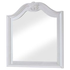 a white framed mirror with an ornate design on the top and bottom edge, against a white background