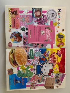 an assortment of stickers and magnets on a piece of paper with hello kitty