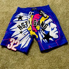 Hustle Gang Shorts Excellent Condition Size Small Blue Athletic Shorts With Elastic Waistband For Beach Season, Blue Athletic Shorts For The Beach, Blue Athletic Shorts With Built-in Shorts For Summer, Stretch Blue Athletic Shorts For Beach Season, Graphic Print Sports Shorts, Blue Athletic Shorts With Elastic Waistband For Streetwear, Blue Sports Pants For Summer, Summer Sports Short Pants, Sporty Blue Bottoms With Graphic Print