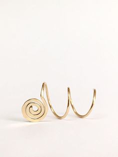 Gorgeous spiral threader earrings. Minimalist, comfortable, perfect for everyday use. The earrings are sold as single or as a pair of your choice and in 14K gold filled or sterling silver 925, see variations in drop-down menu. Measures: Each ear hoop is 9mm diameter. For different size, please contact us. How to use: 1. Adjust spiral width to much your piercings. 2. Insert the earring to first hole and then twist throw each hole. Made to order. Will arrive in a pretty gift box ready to give or k Adjustable Spiral Hoop Earrings, Metal Spiral Wrap Earrings, Spiral Metal Wrap Earrings, Spiral Ear Cuff, Metal Spiral Wrap Single Earring, Spiral Cartilage Earrings As Gift, Hoop Earrings Piercing, Triple Piercing, Gold Threader Earrings