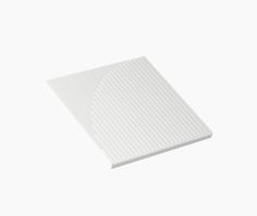 a white plastic sheet with vertical lines on the top and bottom, against a white background