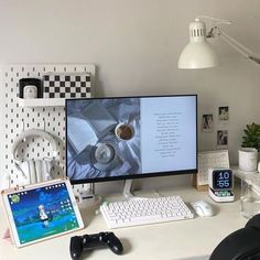 a desktop computer sitting on top of a white desk