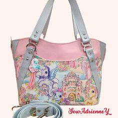 Introducing a delightful pastel My Little Pony G3 handbag, meticulously crafted to order. This unique purse combines a fabric featuring the charming MLP Generation 3 ponies motif with pastel pink and blue vinyl accents. This handbag is a testament to the utmost attention given to every detail, ensuring a high-quality accessory that you'll proudly carry. The main fabric of the bag features a delightful cotton print showcasing the lovable G3 My Little Ponies, while the coordinating fabric is made Pastel Rectangular Bags For Daily Use, Rectangular Pastel Bags For Daily Use, Kawaii Multicolor Rectangular Bag, Multicolor Kawaii Bag With Zipper Closure, Unicorn Purse, My Little Pony Bag, Playful Multicolor Unicorn Print Bags, Painted Purse, Custom Handbags