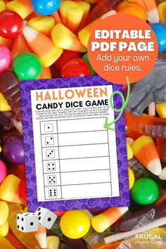 halloween candy dice game with the words editable on it and an image of some candies